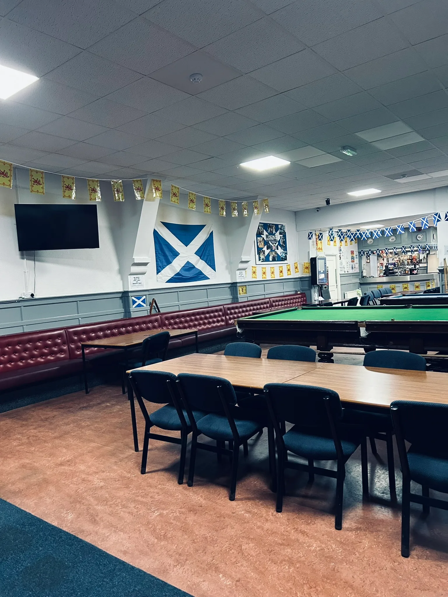 Tables, seating and cue-sports tables in the club games room